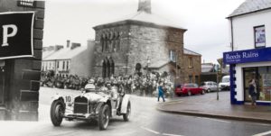 Ards Tourist Trophy Race entering Conway Square, Newtownards, County Down: 1929 & 2015.